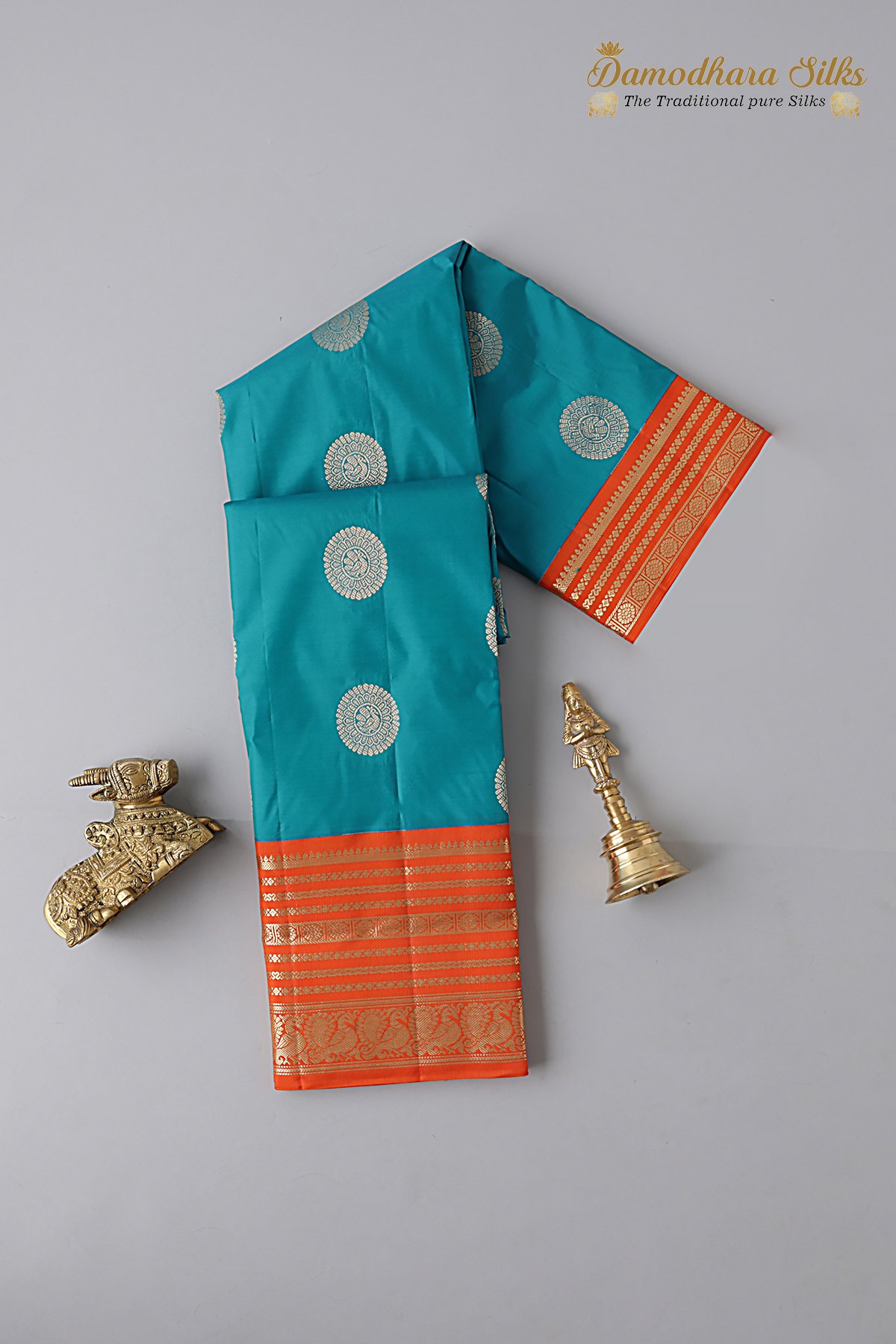 Rama Green With Orange Peacock Butta Motif Kanchipuram Silk Saree